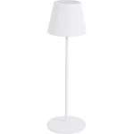 Lampe blanche élancée, posée sur une table en bois clair, ambiance douce et m