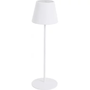 Lampe blanche élancée, posée sur une table en bois clair, ambiance douce et m